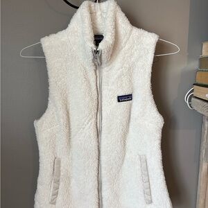 Patagonia Cream Sherpa Vest Jacket with Black Logo Patch and Multicolor Detail